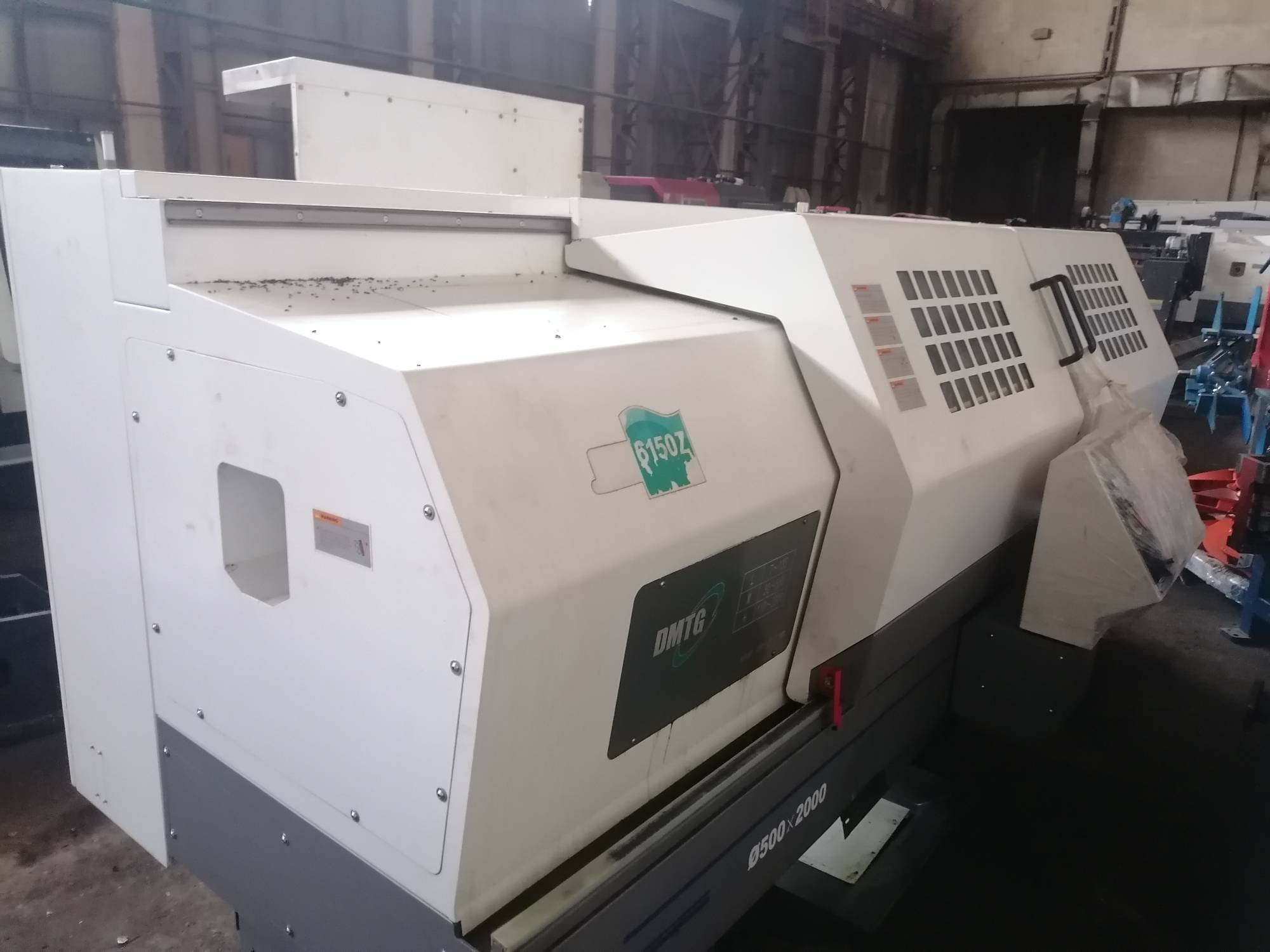 Токарный станок DMTG CKE6150Z/2000