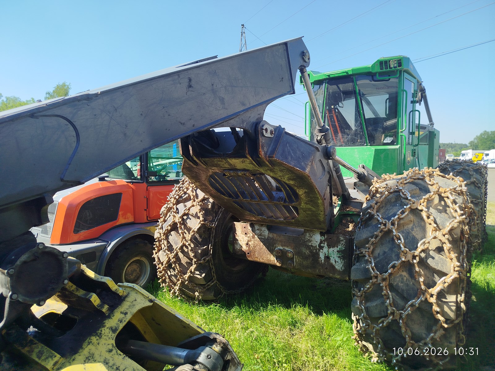 Трактор John Deere 748L